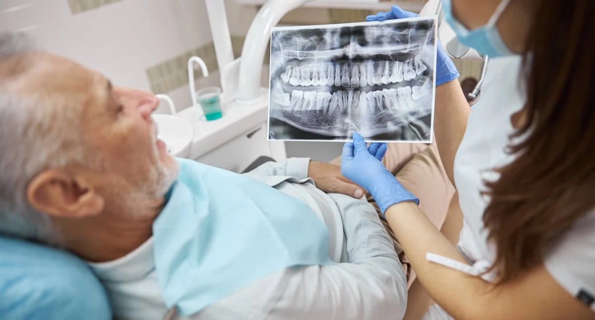 Informator / Materiały zewnętrzne , odbudowa całego łuku zębowego sześciu implantach - zdjęcie, fotografia