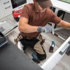 Handyman Doing Kitchen Furniture Installation